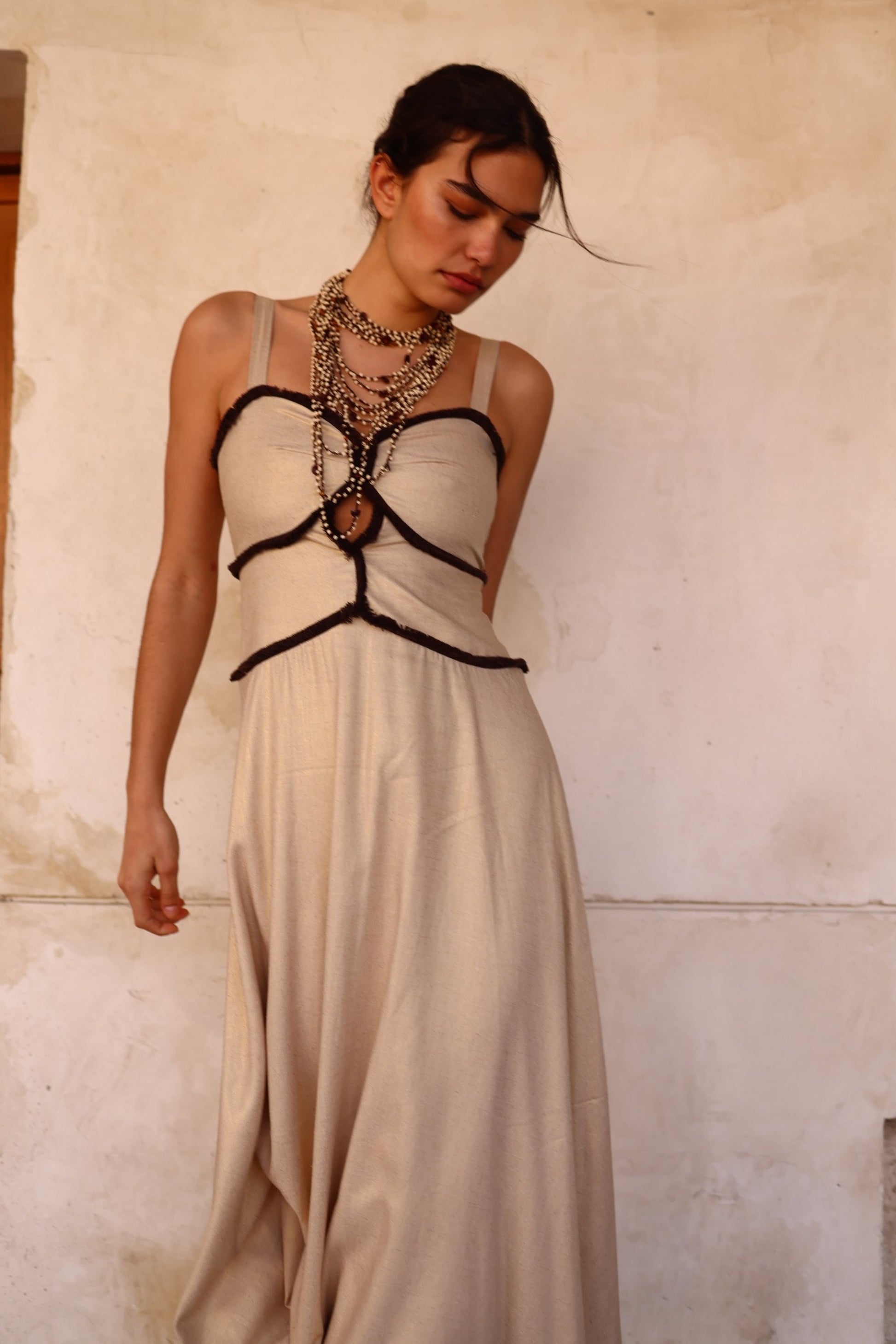 Vestido Arena lino detalle cuerpo estructurado